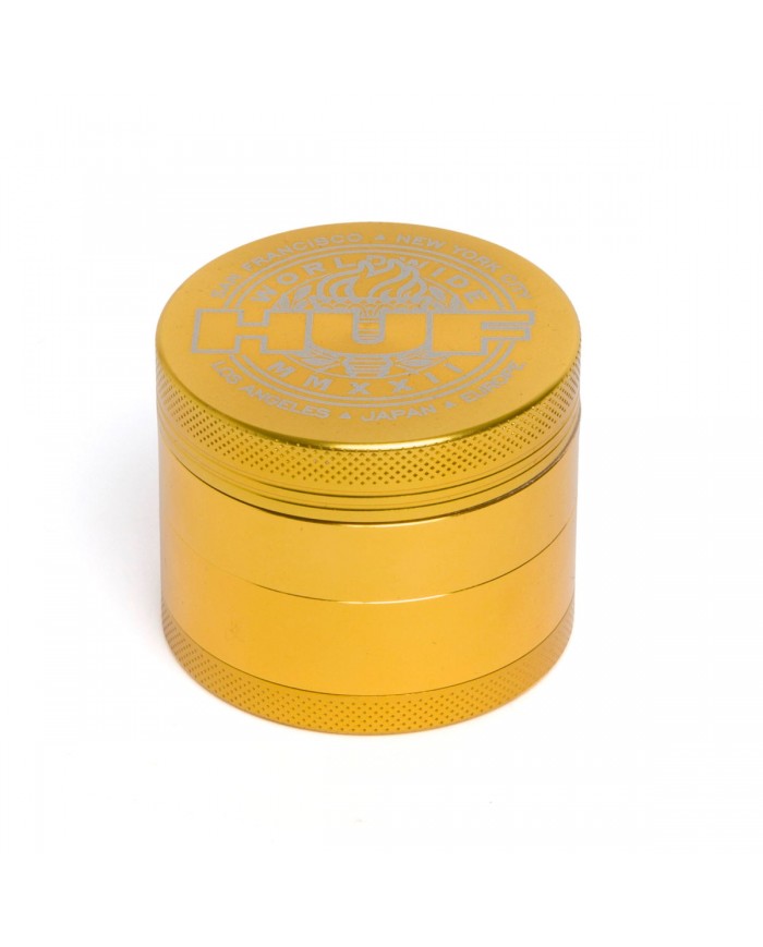 HUF grinder gold